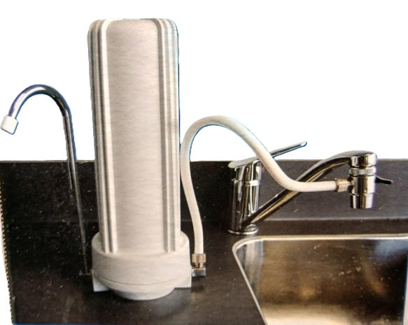 benchtop water filter connected to the kitchen tap