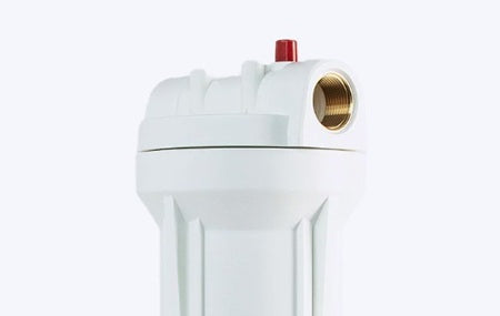 White water filter housing with brass fitting on a white background