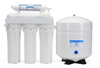 Water filtration system with multiple cylindrical tanks on a white background
