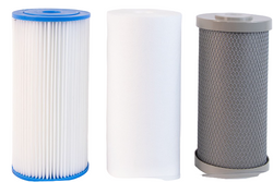 Two filter cartridges, one white and cylindrical with a blue top, the other gray and cylindrical, on a white background.